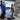 couple with child getting on a airplane with beautiful backdrop.